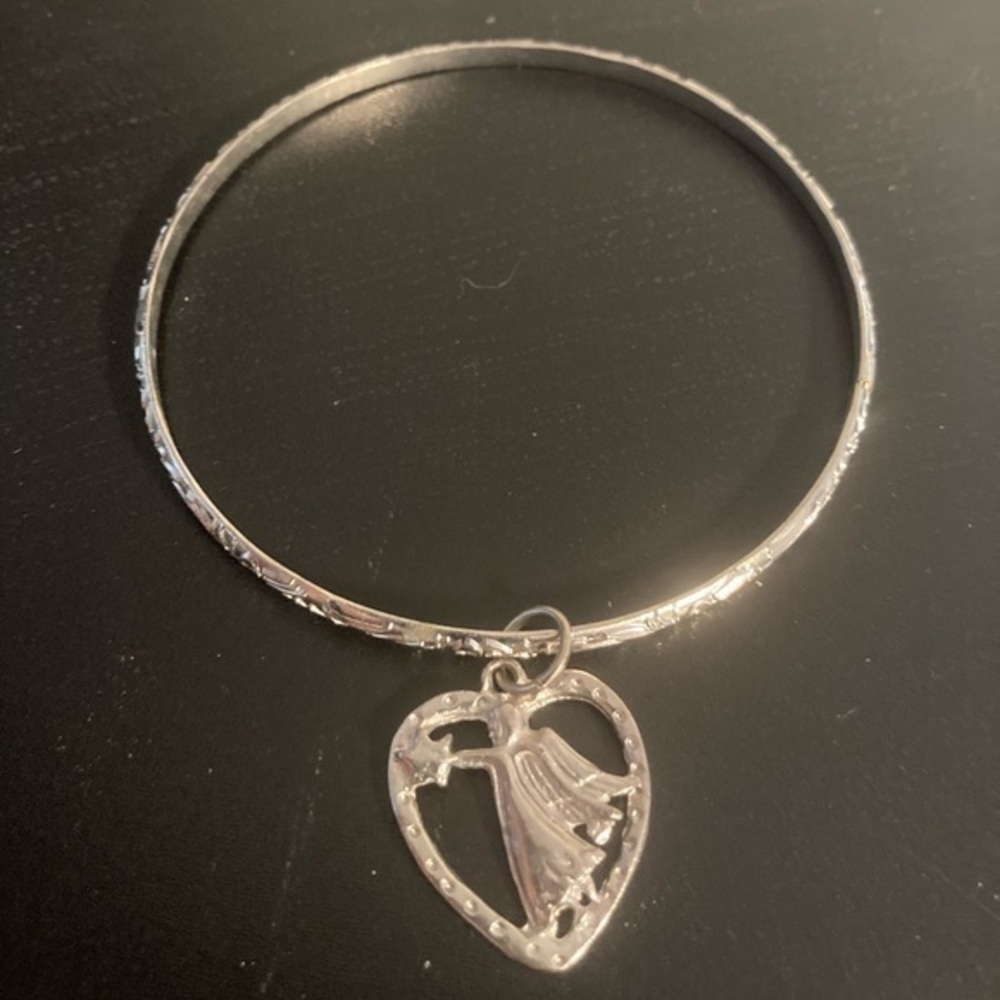 Silver tone angle charm bracelet